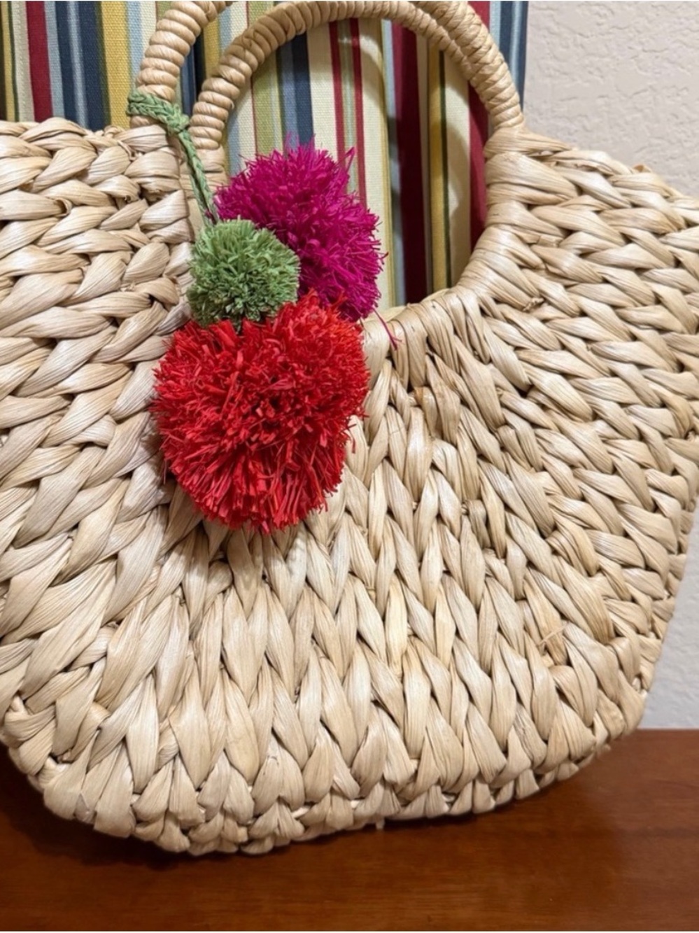 Handwoven Straw Tote Bag with Colorful Pom-Pom Charms